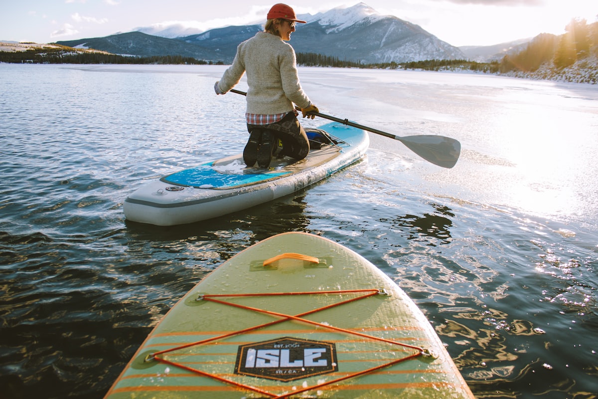 Stand-up paddleboarding on calm water