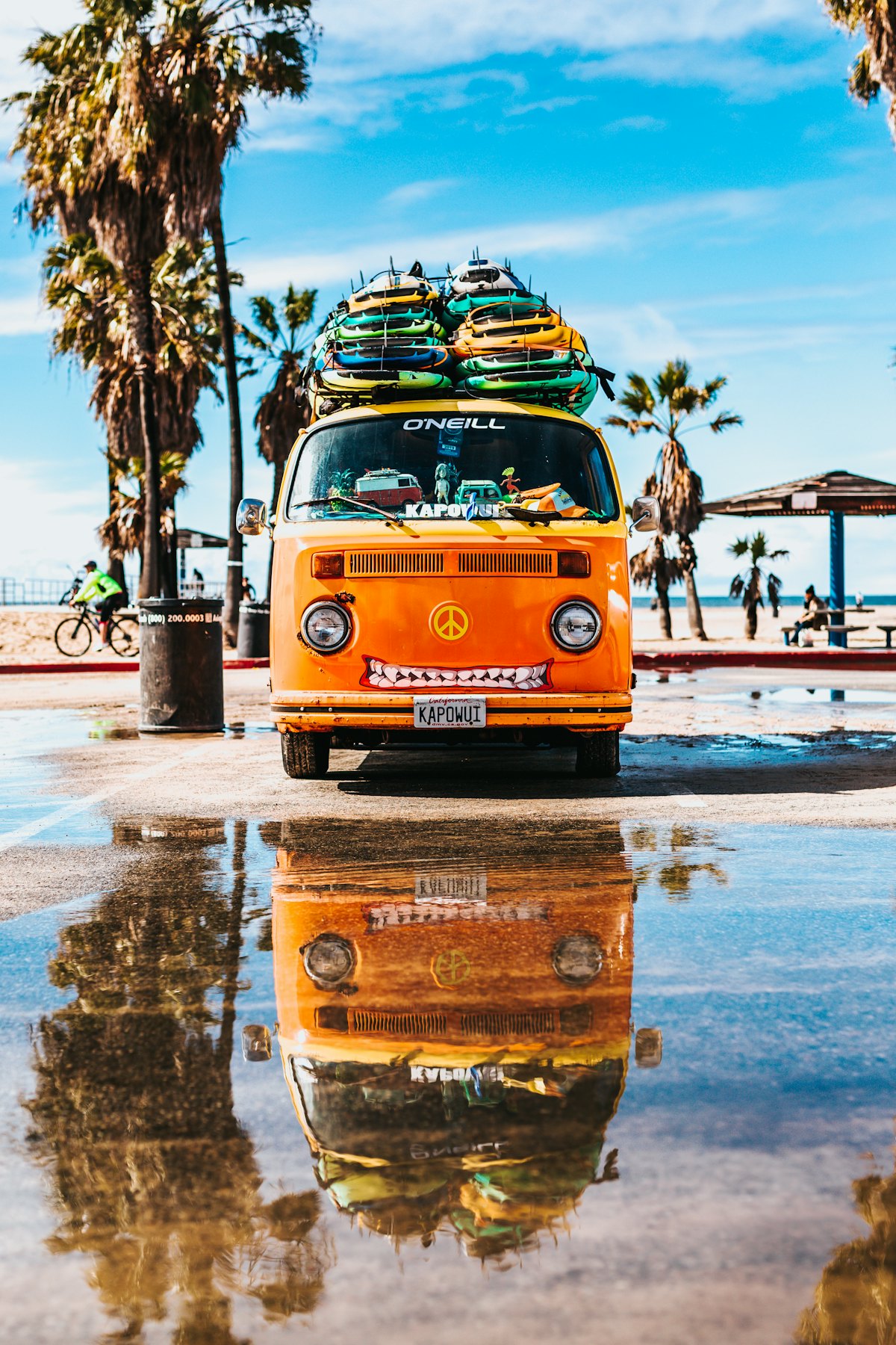 Surf van loaded with boards